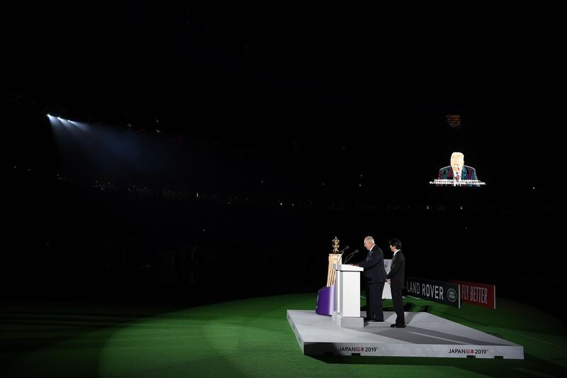 Japan's Crown Prince Akishino, right, listens to World Rugby chairman Bill Beaumont speak during the opening ceremony. AFP