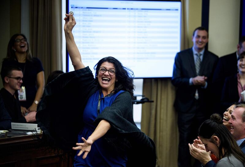 TOPSHOT - US Representative-elect Rashida Tlaib (D-MI) reacts to a good number during an office lottery for new members of Congress on Capitol Hill November 30, 2018 in Washington, DC. / AFP / Brendan Smialowski

