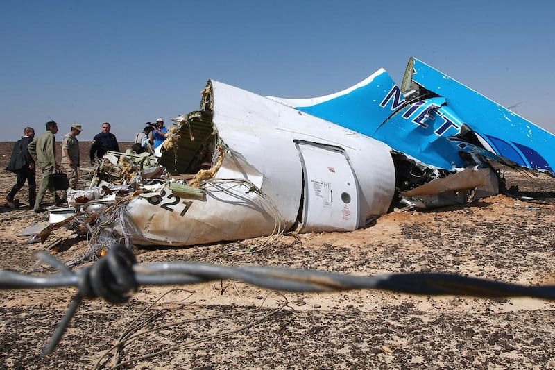 Russian emergency minister Vladimir Puchkov, fourth left, visits the crash site of a A321 Russian airliner in Wadi al-Zolomat, a mountainous area of Egypt’s Sinai Peninsula. Russian airline Kogalymavia’s flight 9268 crashed en route from Sharm el Sheikh to Saint Petersburg on October 31, killing all 224 people on board. AFP
