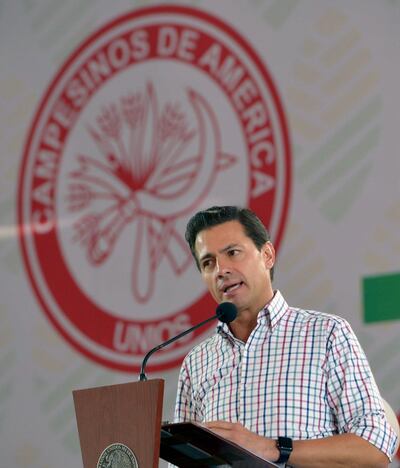 Mexican President Enrique Pena Nieto delivers a speech during a meeting with members of the National Peasant Confederation (CNC) in Mexico City, Mexico, in this handout photograph released to Reuters by the Mexico Presidency on August 27, 2018. Mexico Presidency/Handout via REUTERS ATTENTION EDITORS - THIS IMAGE WAS PROVIDED BY A THIRD PARTY