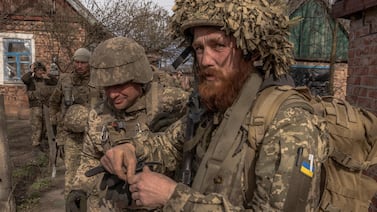 Ukrainian infantry soldiers of the 23rd Mechanised Brigade prepare to head for the frontline near Avdiivka, in the Donetsk region, on April 3, 2024. AFP