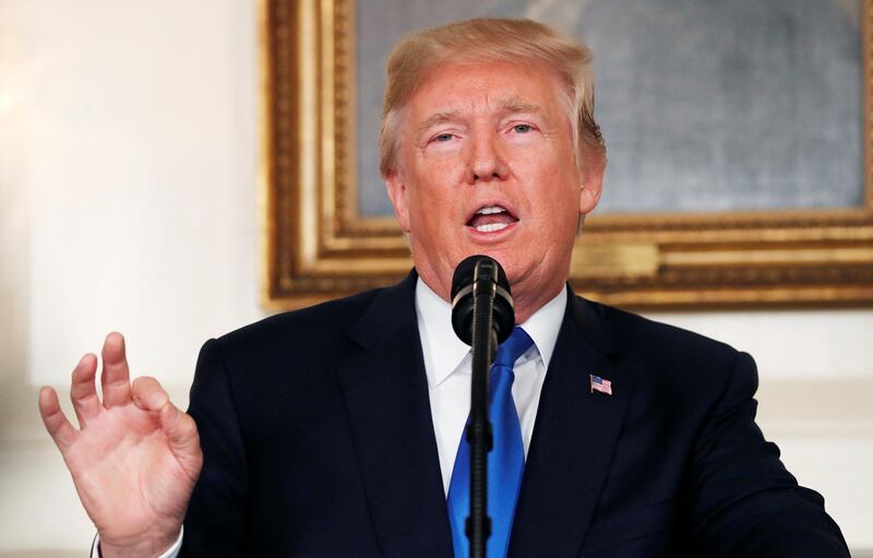 FILE PHOTO: U.S. President Donald Trump speaks about Iran and the Iran nuclear deal in the Diplomatic Room of the White House in Washington, DC, U.S., October 13, 2017. REUTERS/Kevin Lamarque/File Photo