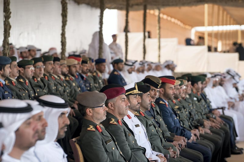 ZAYED MILITARY CITY, ABU DHABI, UNITED ARAB EMIRATES - November 28, 2017: UAE Armed Forces members attend the graduation ceremony of the 8th cohort of National Service recruits and the 6th cohort of National Service volunteers at Zayed Military City. 
( Mohamed Al Hammadi / Crown Prince Court - Abu Dhabi )
---