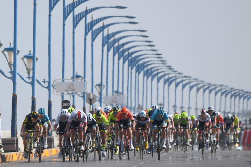 The pack sprints at the end of the first stage of the cycling Tour of Oman from Al Sawadi Beach to Suhar Corniche, in Muscat.  AFP