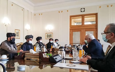 A picture obtained by AFP from the Iranian news agency Tasnim on January 31, 2021, shows 
Iran' Foreign Minister Mohammad Javad Zarif (2nd-R) meeting with Mullah Abdul Ghani Baradar (2nd-L) of the Taliban in Tehran. Iran's Foreign Minister Mohammad Javad Zarif called for the formation of an "all-inclusive" Afghan government during a meeting with a Taliban delegation in Tehran. A delegation from the movement headed by its co-founder Mullah Abdul Ghani Baradar arrived in Iran on January 26 to exchange "views on the peace process in Afghanistan" at the invitation of the ministry. / AFP / TASNIM NEWS / -
