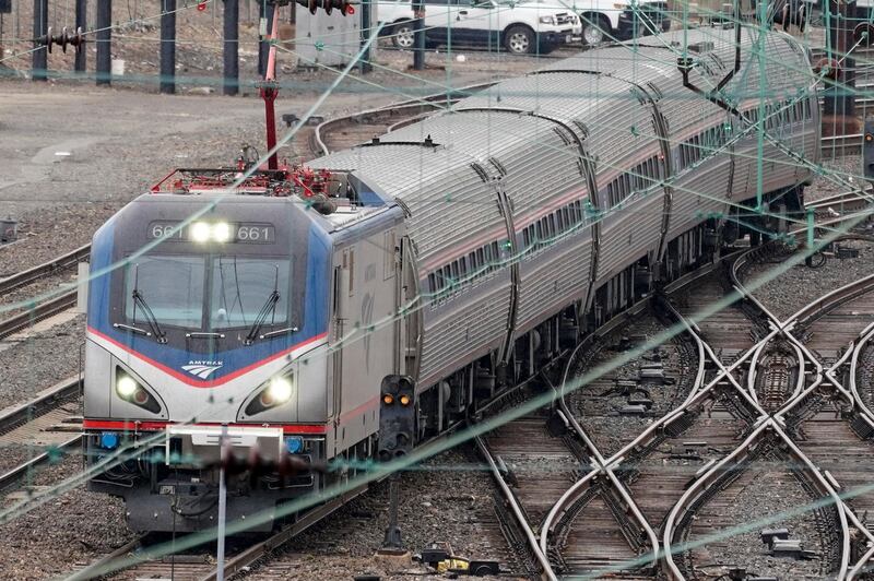 An Amtrak train departs 30th Street Station in Philadelphia, Wednesday, March 31, 2021. Looking beyond the $1.9 trillion COVID relief bill, President Joe Biden and lawmakers are laying the groundwork for another of his top legislative priorities â€” a long-sought boost to the nation's roads, bridges and other infrastructure that could meet GOP resistance to a hefty price tag. (AP Photo/Matt Rourke)