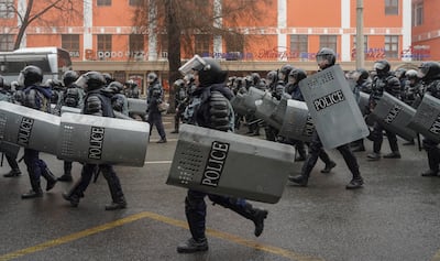 Riot police officers on patrol during rally over a hike in energy prices in Almaty, Kazakhstan, January 5, 2022. EPA