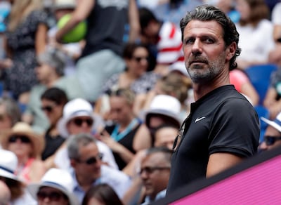 FILE - In this Tuesday, Jan. 15, 2019 file photo, Serena Williams' coach Patrick Mouratoglou watches her first round match against Germany's Tatjana Maria at the Australian Open tennis championships in Melbourne, Australia. With tennis majors on hold and discussions ongoing over whether the U.S. Open or the French Open can even take place later this year, a new digitally friendly tournament starts Saturday in southern France with four Top 10-ranked players involved. (AP Photo/Kin Cheung, File)