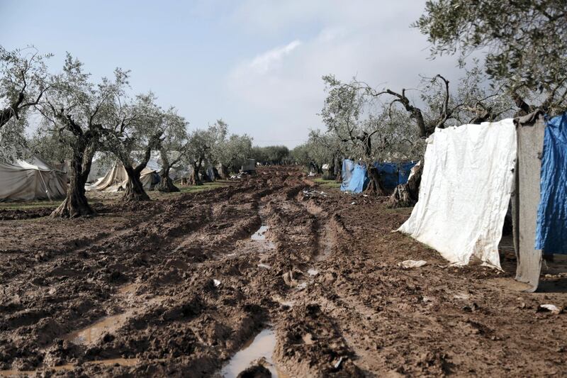 Location: Al-Karama camp in Atama. The aftermath of heavy rainfall on north Syria, residents lost their furniture, clothes and bedding as well as the tents waiting outside in open lands until the civil defense and NGs arrive to rescue them.