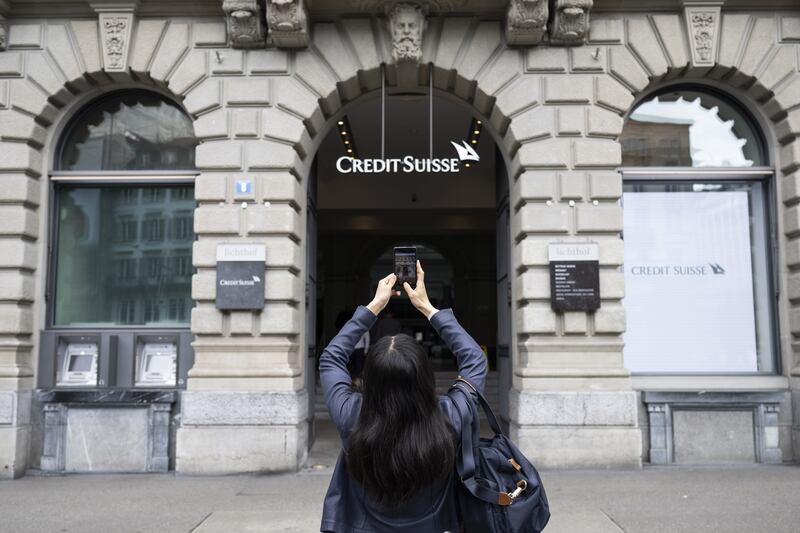 Financial markets are reacting after troubled bank Credit Suisse was rescued in a $3.23 billion purchase by its Swiss rival UBS in a government-backed deal. EPA
