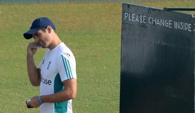 England captain Alastair Cook applies sunscreen during a training session at the Brabourne Stadium in Mumbai on November 4, 2016. England play a five-match Test series against India with the first Test at Rajkot from November 9-13. Indranil Mukherjee / AFP