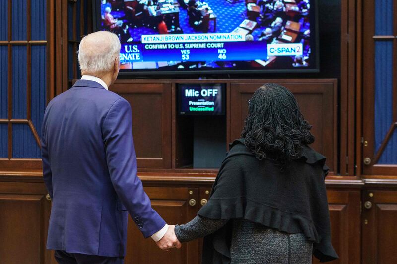 US President Joe Biden and Judge Ketanji Brown Jackson watch the Senate vote on her nomination to be an associate justice on the US Supreme Court, from the Roosevelt Room of the White House in Washington.  AFP