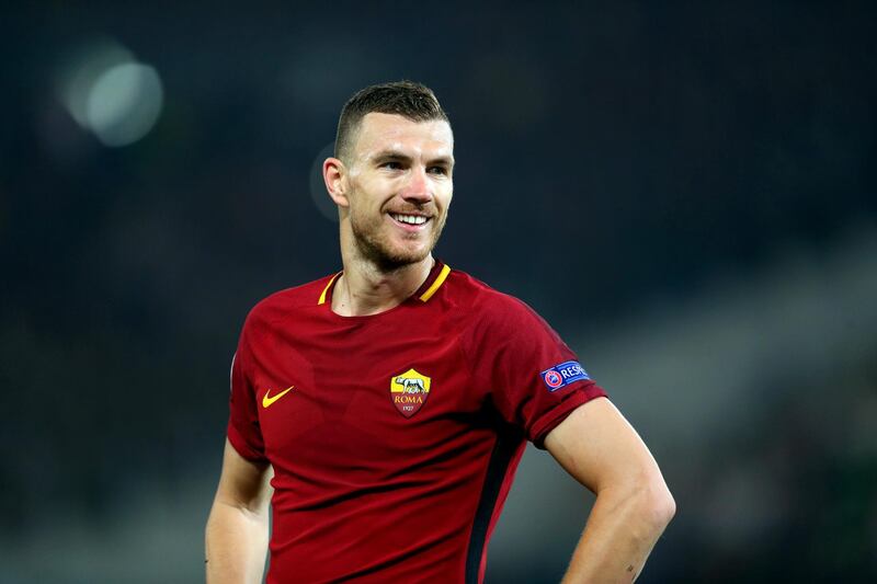 ROME, ITALY - APRIL 10: Edin Dzeko of AS Roma during the UEFA Champions League Quarter Final Leg Two between AS Roma and FC Barcelona  at Stadio Olimpico on April 10, 2018 in Rome, Italy. (Photo by Catherine Ivill/Getty Images) 