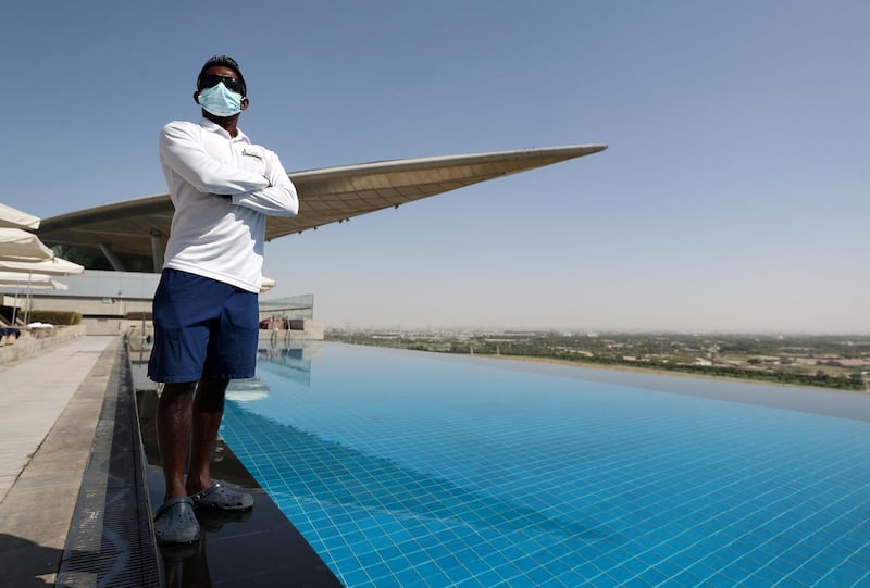 Dubai, United Arab Emirates - Reporter: N/A. News. Coronavirus/Covid-19. An lifeguard at The Meydan Hotel with a mask on to prevent the spread of Covid-19. Monday, October 26th, 2020. Dubai. Chris Whiteoak / The National