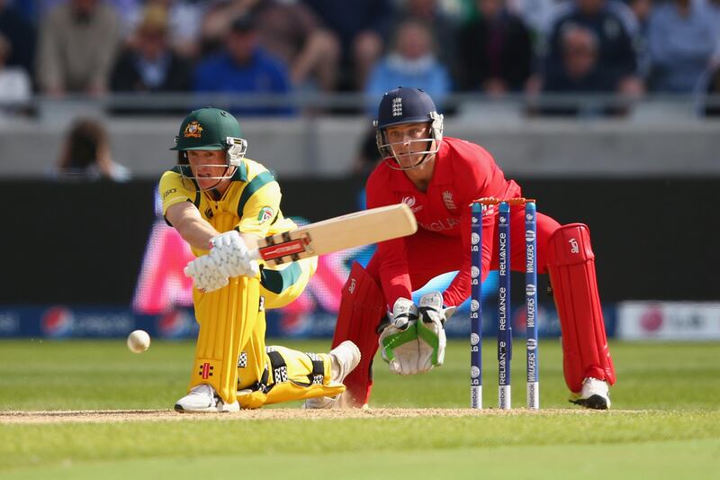 BIRMINGHAM, ENGLAND - JUNE 08:  George Bailey of Australia reverse sweeps a delivery as wicketkeeper Jos Buttler (R) of England looks on during the Group A ICC Champions Trophy match between England and Australia at Edgbaston on June 8, 2013 in Birmingham, England.  (Photo by Michael Steele/Getty Images) *** Local Caption ***  170164143.jpg