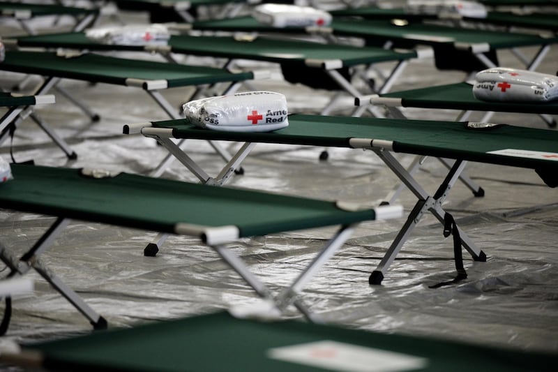 Rows of cots sit at a shelter ahead of Hurricane Florence at East Mecklenburg High School in Charlotte. Callaghan O'Hare / Bloomberg
