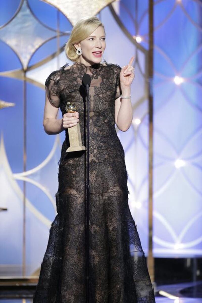 Cate Blanchett accepts her award. Reuters