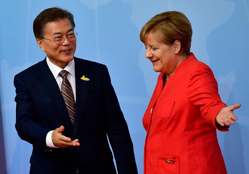 German Chancellor Angela Merkel South Korea's President Moon Jae-in.  Tobias Schwarz / AFP Photo