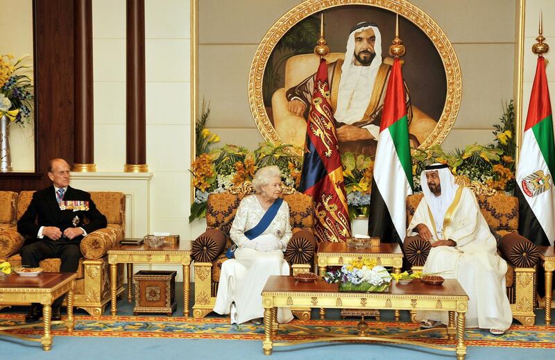 ABU DHABI, UNITED ARAB EMIRATES - NOVEMBER 25: Queen Elizabeth II speaks with Sheikh Khalifa Bin Zayed al Nahyan the President of the United Arab Emirates, accompanied by Prince Philip the Duke of Edinburgh (far left) at the Mushrif Palace on November 25, 2010 in Abu Dhabi, United Arab Emirates. Queen Elizabeth II and Prince Philip, Duke of Edinburgh are in Abu Dhabi on a State Visit to the Middle East. The Royal couple will spend two days in Abu Dhabi and three days in Oman. (Photo by John Stillwell - Pool/Getty IMages)