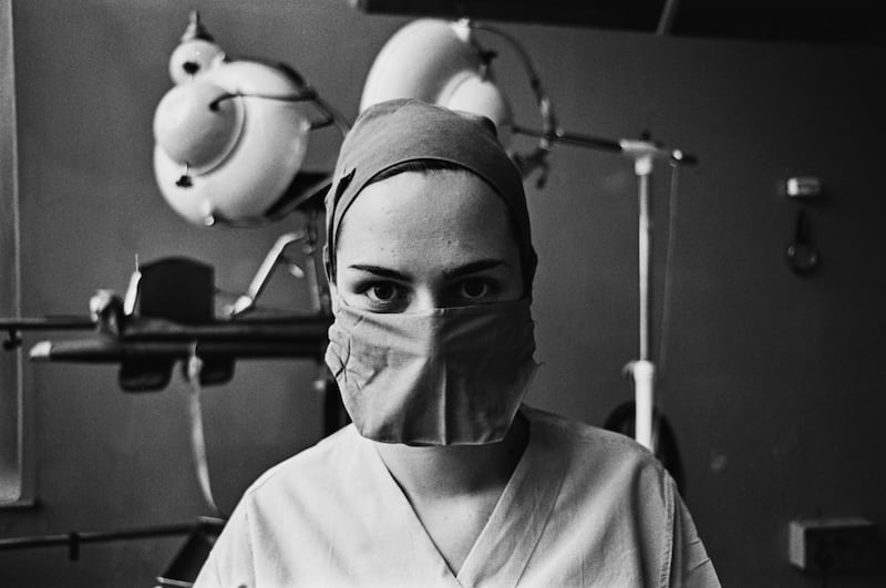 A nurse in the operating theatre of St Bartholomew's Hospital, London, in 1968. Getty Images