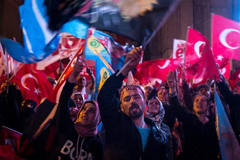 People celebrating the ‘Evet’ (Yes) vote result outside the governing AK Party headquarters in Ankara. (Photo: Chris McGrath / Getty Images)