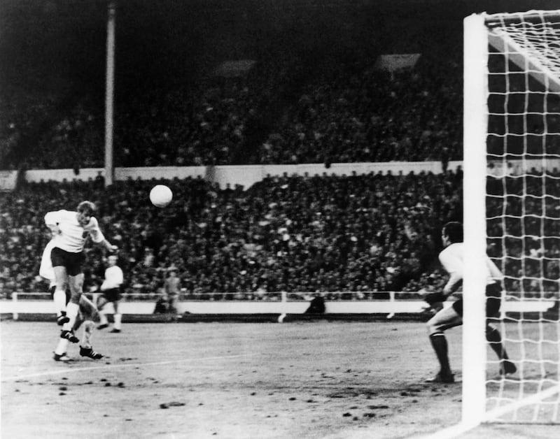 Roger Hunt (L) scores against France in the 1966 World Cup. AFP
