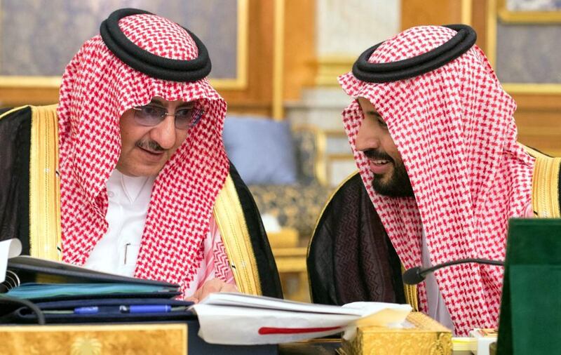 Saudi Crown Prince and Minister of Interior, Prince Mohammed bin Nayef, left, and deputy crown prince and Minister of Defence, Prince Mohammed bin Salman, attending a cabinet meeting in coastal city of Jeddah. In a press conference in Jeddah, officials revealed sweeping plans to create some 450,000 non-government jobs by 2020, boost non-oil revenues and cut the cost of public wages.  AFP Photo  /  HO  /  SPA

