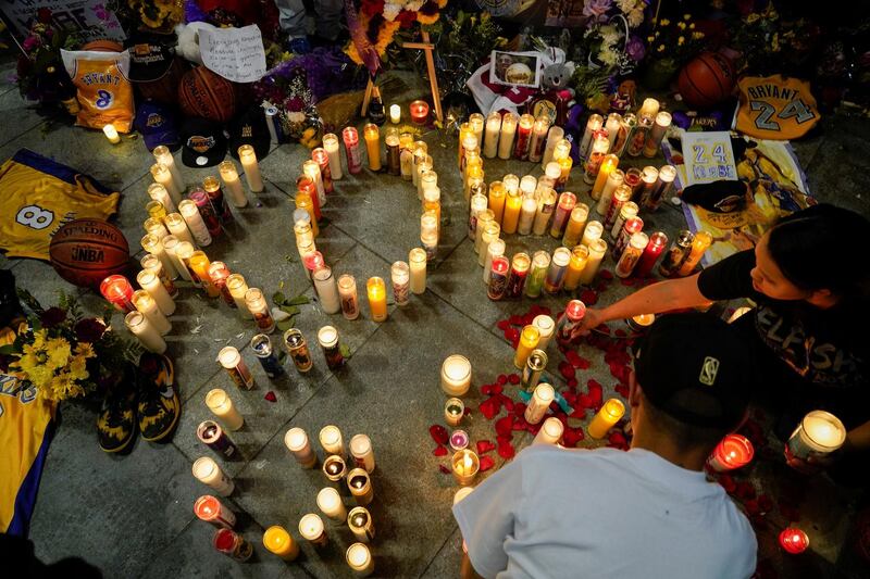 Mourners gather in Microsoft Square near the Staples Center to pay respects to Kobe Bryant after a helicopter crash killed the retired basketball star, in Los Angeles, California, U.S. REUTERS