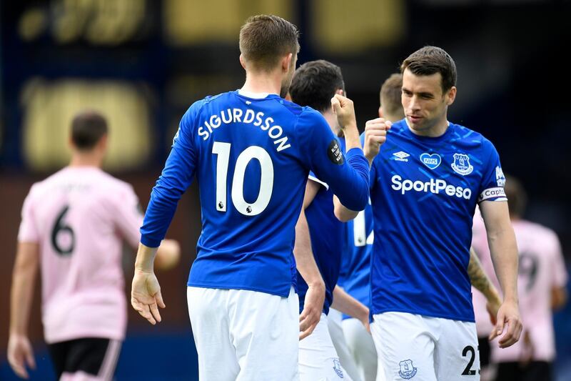 Everton's Gylfi Sigurdsson, left, reacts after scoring his side's second goal at Goodison Park. AP