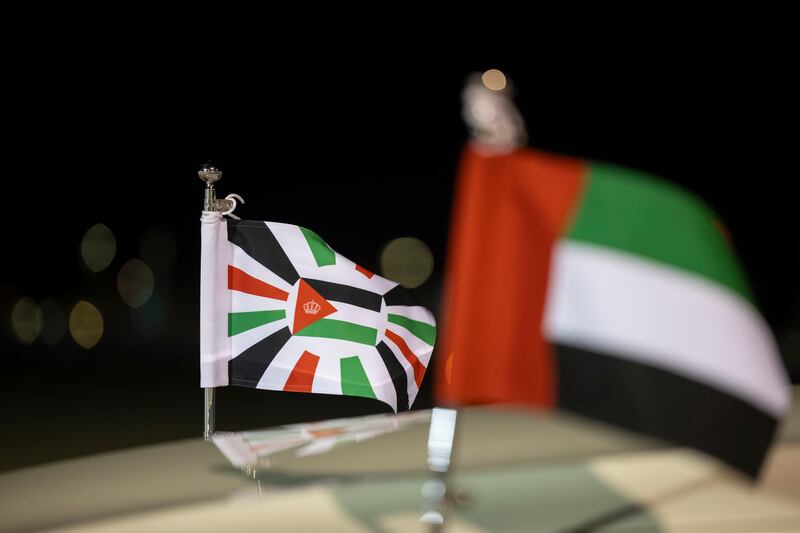 Flags on a vehicle during the arrival of King Abdullah