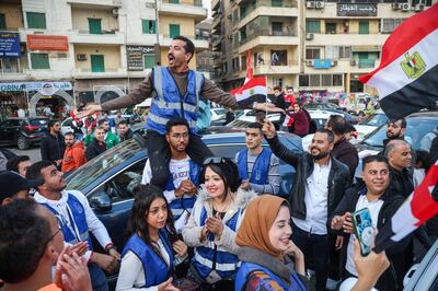 Supporters of Abdel Fattah El Sisi, Egypt's President, celebrate in the street following his election victory in Cairo. Bloomberg