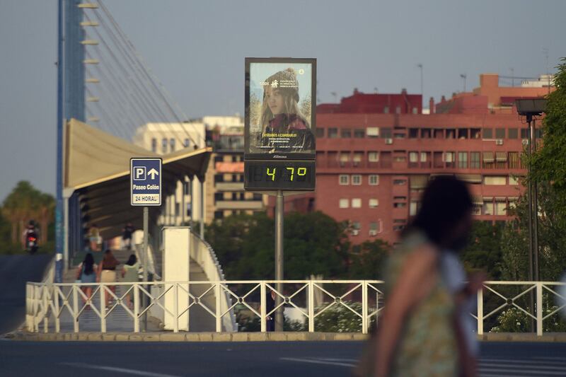 A street thermometer reading 47ºC during a heatwave, in Seville, Spain, in August. AFP