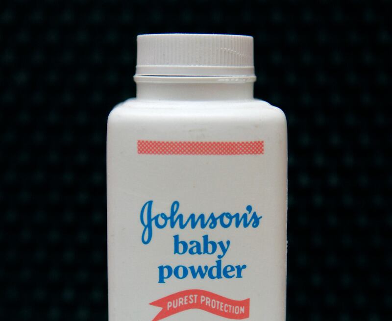FILE - In this April 15, 2011, file photo, a bottle of Johnson's baby powder is displayed. On Monday, Aug. 21, 2017, a Los Angeles County Superior Court spokeswoman confirmed that a jury has ordered Johnson & Johnson to pay $417 million in a case to a woman who claimed in a lawsuit that the talc in the company's iconic baby powder causes ovarian cancer when applied regularly for feminine hygiene. (AP Photo/Jeff Chiu, File)