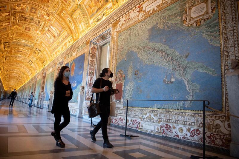Visitors admire the Gallery of Maps as Vatican Museums reopened, Vatican City.  EPA