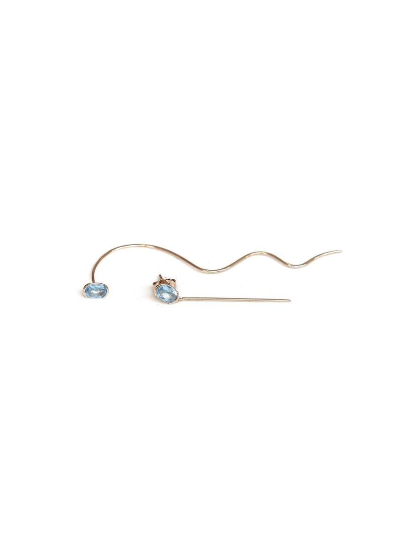 Needle and thread topaz earrings; Dh2,340