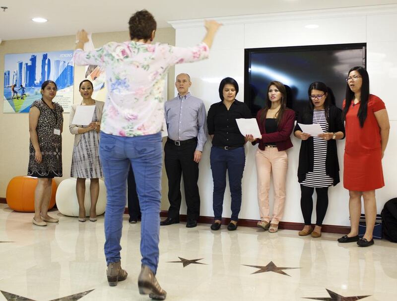 The Atkins Corporate Choir practices in Bur Dubai. Companies have been embracing the trend of gathering employees together to make music and increase morale. Anna Nielsen for The National