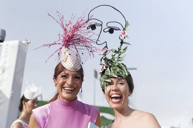 Charlotte Hudders, right, won the Most Creative Hat contest. Reem Mohammed / The National
