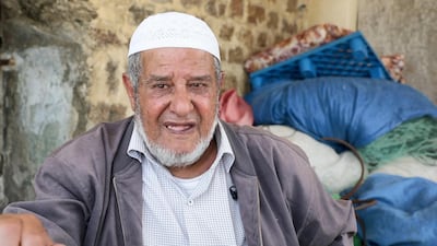 Abu Jamil, 84, sits in the remnants of the Palestinian village of Tantura. Willy Lowry / The National