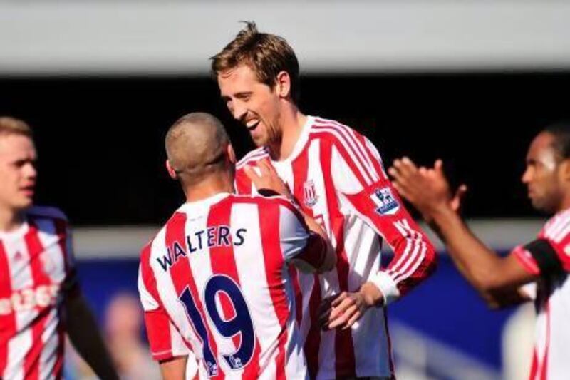 Stoke City’s Peter Crouch, right, and Jonathan Walters each found the net in Stoke City’s 2-0 victory over Queens Park Rangers yesterday. Glyn Kirk / AFP