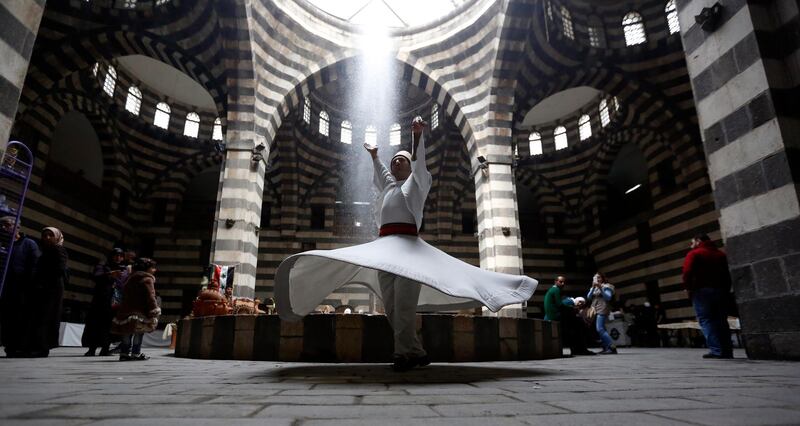 Dervish dancers perform at Khan Asaad Basha in the old city of Damascus, Syria. EPA