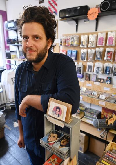 Giorgio Carbone, co-founder of Mars Tapes, in his shop in Manchester.  Photo by Paul Ellis  /  AFP