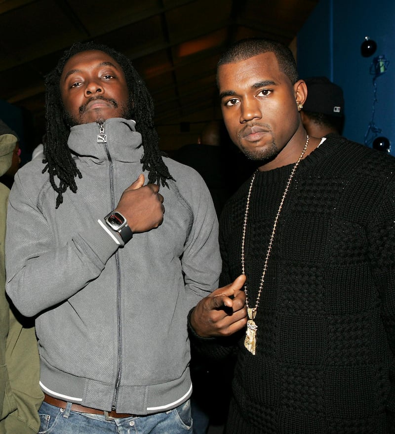 ROME - NOVEMBER 18:  (U.S. TABS OUT)  Wil.I.Am of The Black Eyed Peas (L) and rapper Kanye West pose backstage during the MTV Europe Music Awards 2004 at Tor di Valle November 18, 2004 in Rome, Italy.  (Photo by Frank Micelotta/Getty Images)