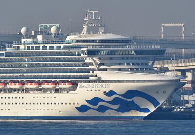 The Diamond Princess cruise ship is seen anchored at the Daikoku Pier Cruise Terminal in Yokohama port on February 13, 2020. At least 218 people on board a cruise ship quarantined off Japan have tested positive for the novel COVID-19 coronavirus, authorities said February 13 as they announced plans to move some elderly passengers off the ship. / AFP / Kazuhiro NOGI
