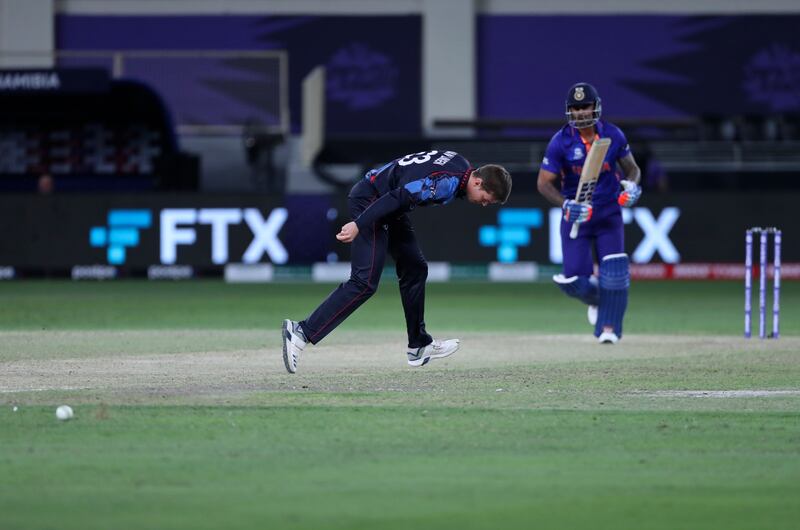 Namibia's Michael Van Lingen watches the ball run down the field. AP