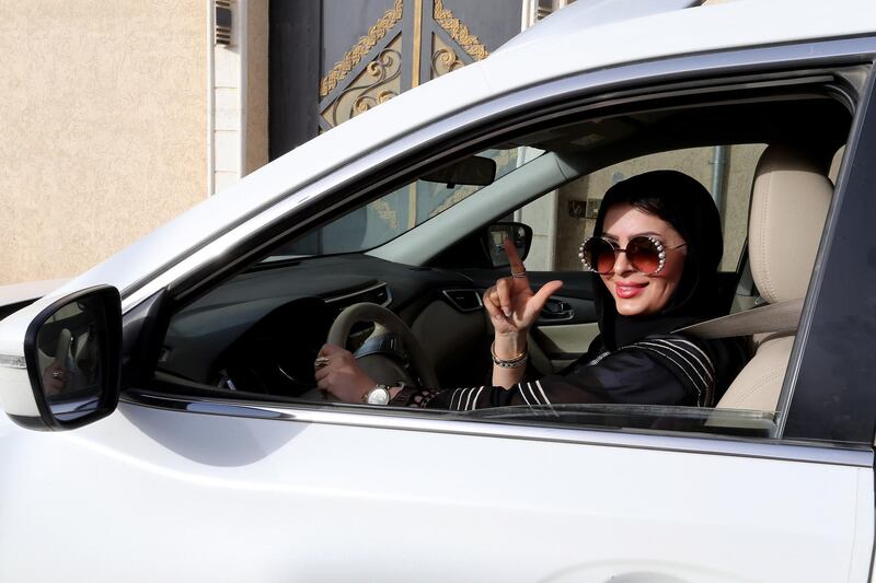 epa06836502 Huda al-Badri, 30, poses behind a steering wheel as women are alowed to drive for the first time through the streets of the capita, Riyadh, Saudi Arabia, in the early morning hours of 24 June 2018 when the royal decree lifted the ban on women driving a car in Saudi Arabia. Women in Saudi Arabia took the wheel early on Sunday after lifting the decades-old ban as part of a liberation campaign in the conservative kingdom.  EPA/AHMED YOSRI