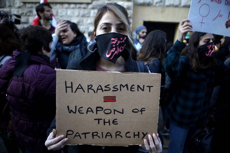 An activist takes part in a demonstration against sexual harassment, rape and domestic violence in the Lebanese capital Beirut on December 7, 2019.  - RESTRICTED TO EDITORIAL USE - MANDATORY CREDIT "AFP PHOTO / ABAAD / PATRICK BAZ - NO MARKETING NO ADVERTISING CAMPAIGNS - DISTRIBUTED AS A SERVICE TO CLIENTS -
 / AFP / Abaad / Patrick BAZ / RESTRICTED TO EDITORIAL USE - MANDATORY CREDIT "AFP PHOTO / ABAAD / PATRICK BAZ - NO MARKETING NO ADVERTISING CAMPAIGNS - DISTRIBUTED AS A SERVICE TO CLIENTS -
