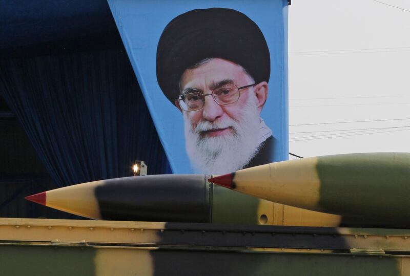 (FILES) This file photo taken on April 18, 2018 shows an Iranian military truck carrying surface-to-air missiles past a portrait of Iran's Supreme Leader Ayatollah Ali Khamenei during a parade on the occasion of the country's annual army day. The commander of Iran's Revolutionary Guards said today that destroying arch-rival Israel was an "achievable goal".
"This sinister regime must be wiped off the map and this is no longer ... a dream (but) it is an achievable goal," Major General Hossein Salami said, quoted by the Guards' Sepah news site. / AFP / ATTA KENARE
