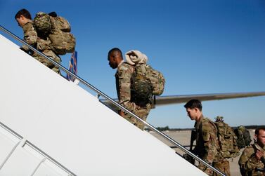US paratroopers board an aircraft bound for the Centcom area of operations in the Middle East, from Fort Bragg, North Carolina this month. EPA