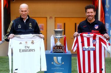 Real Madrid manager Zinedin Zidane with Athletico Madrid counterpart Diego Simeone ahead of their Spanish Super Cup final at the King Abdullah Sports City in Jeddah. Getty Images