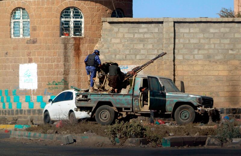 Houthi fighters man an anti-aircraft gun in the Yemeni capital Sanaa on December 2, 2017, during clashes with supporters of Yemeni ex-president Ali Abdullah Saleh. AFP